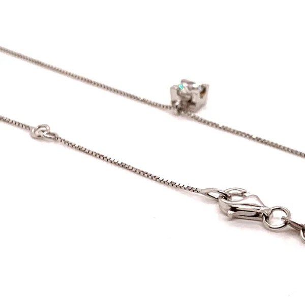 Collana punto luce in oro bianco e diamante ct.0.20 - immagine 5