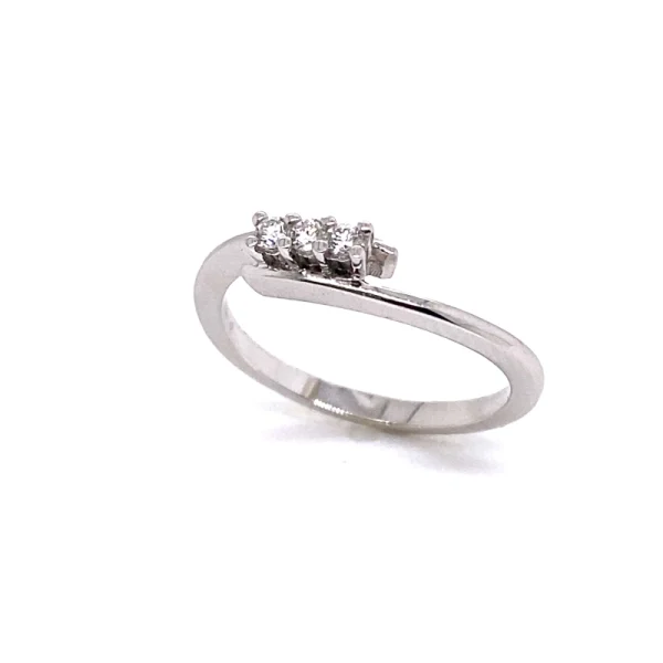 Anello trilogy in oro bianco e diamanti ct.0.12