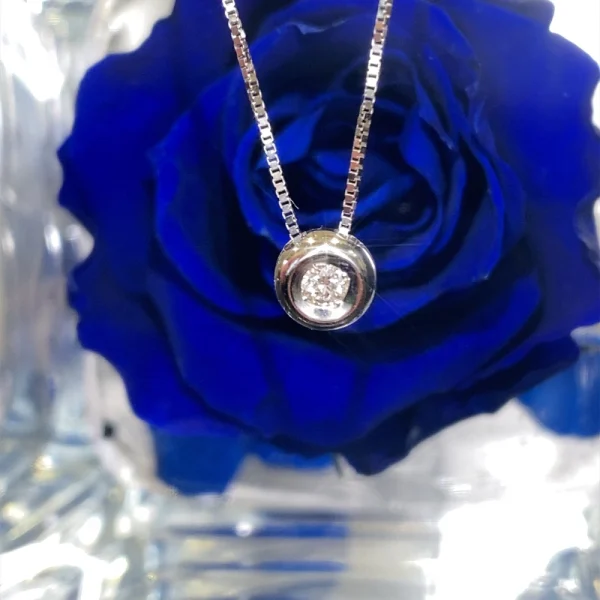Collana punto luce cipollina in oro bianco e diamante ct.0.05