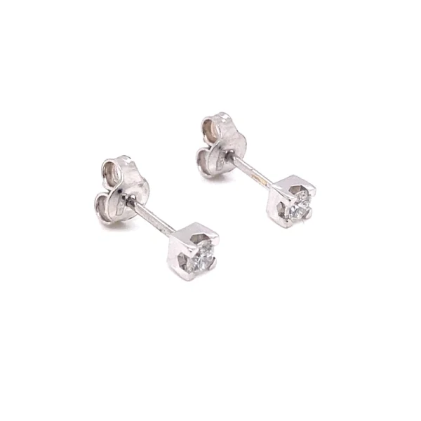 Orecchini punto luce in oro bianco con brillante ct.0.30 - immagine 4